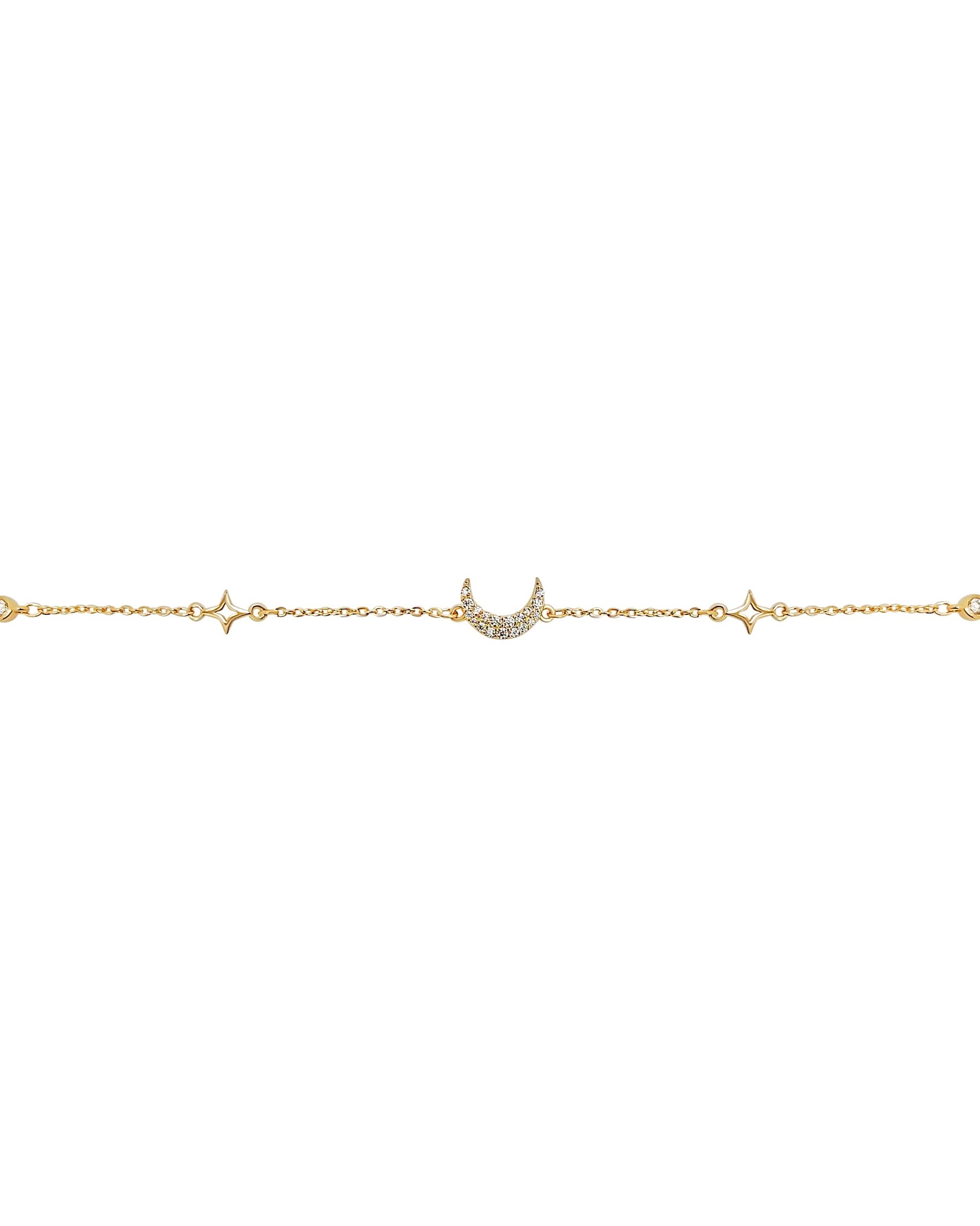 Gold bracelet with star and moon designs. with Cubic Zirconia