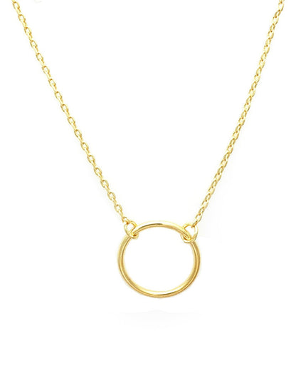 Gold necklace with a small circle pendant on a white background
