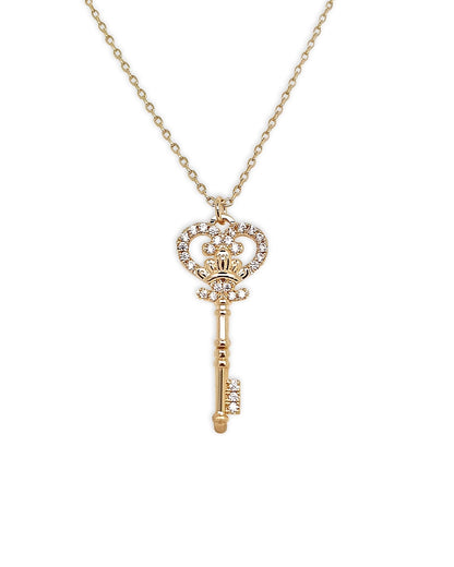 Gold key-shaped pendant necklace on a white background