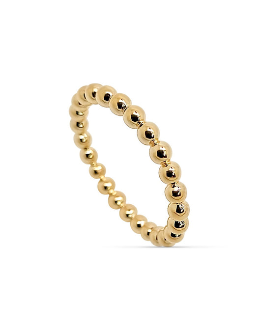 gold-plated beaded ring with polished spherical elements on white background