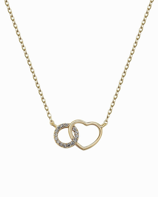 Gold plated heart necklace with cubic zirconia interlinked circle charm on white background