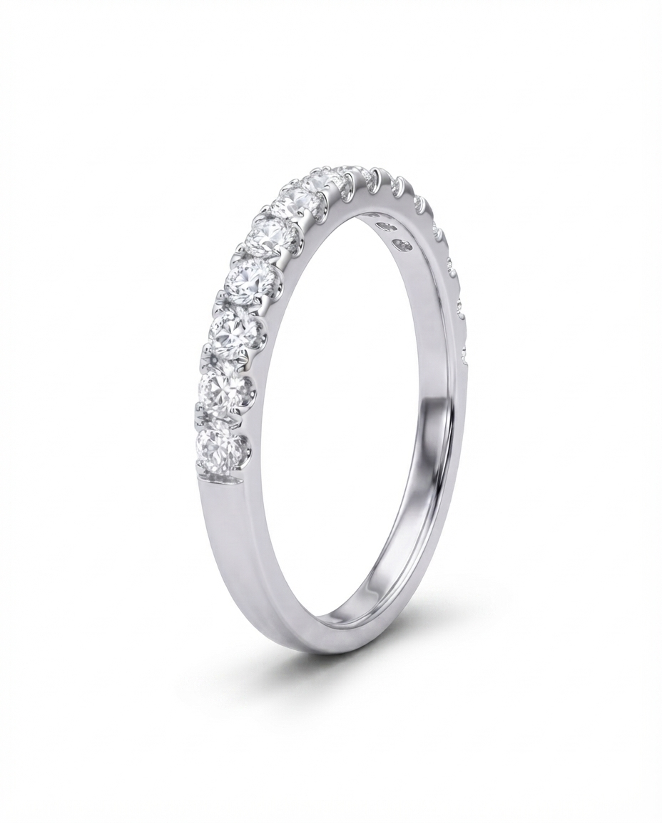 Side view of a 925 sterling silver pavé ring with round-cut cubic zirconia