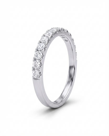 Side view of a 925 sterling silver pavé ring with round-cut cubic zirconia